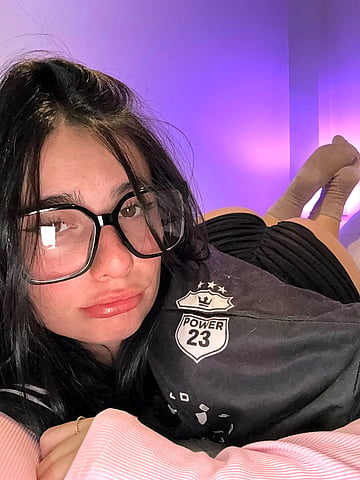 Stripping down in the dorm: would smashing this college babe be too much for you?'