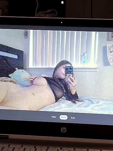 Naughty Schoolgirl Teases with Risky Computer Pics'