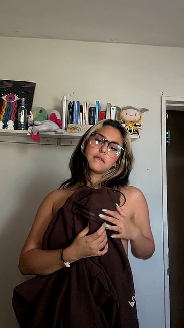 Watch This Cute College Girl Flash Her Perky Tits in a Hot Solo Video - Get Horny Now!'